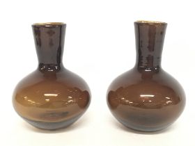 A pair of Micheal Ruh glass vases, no obvious dama