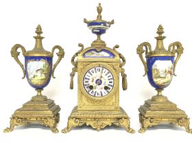 A French gilted clock and garniture decorated with