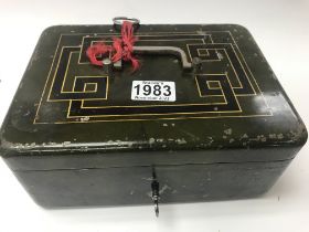 Two old lock boxes both with keys.