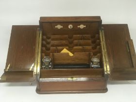 A Quality Victorian walnut stationary box with a w