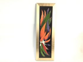 A framed Moorcroft wall plaque. 44cm high and 14cm