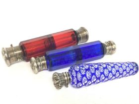 Three Victorian perfume bottles , 10 to 14cm long