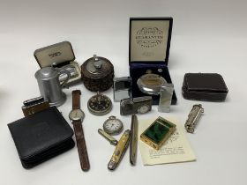 A mixed lot of watches, lighters etc.. including a