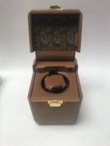 A battery powered watch winding box.