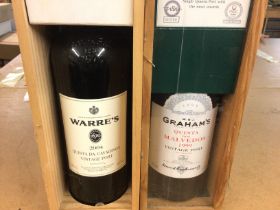 Two bottles of port including a 1999 Grahams and a