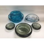 Five Holmegaard coloured glass items, largest diam