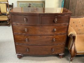 A Victorian bow fronted 5 draw chest or drawers.