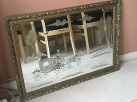 A gilt framed with etched decoration with a horse