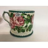 A large Wemyss ware tankard decorated in cabbage r