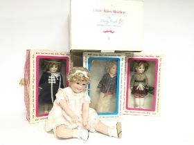 Four boxed vintage Shirley temple dolls including