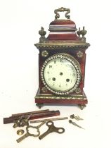 A gilted brass and tortoiseshell mantle clock ,dim