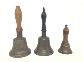 Three Victorian handbells with wooden handles, 13