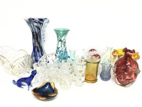 A collection of cut glass including vases, glasses