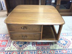 An Ercol Pandora coffee table. 80cm wide 40cm deep