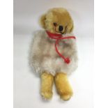 A collectable Merrythought teddy bear muff. Shippi