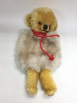 A collectable Merrythought teddy bear muff. Shippi