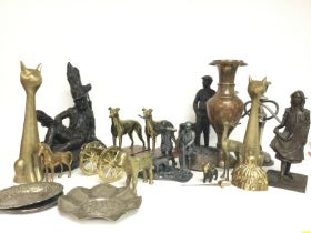 A collection of various statues and ornaments incl