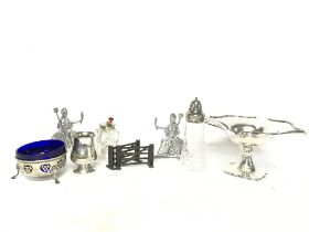 A collection of silver plated items including a pa