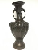 A Japanese bronze vase decorated with cherry bloss