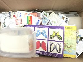 A mixed box of gum and tea cards including loose and two albums. Including Typhoo, Brooke, W.D & H.O