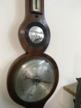 A Georgian mahogany barometer with applied thermom