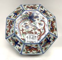 A Chinese hexagonal porcelain bowl and cover with