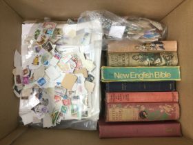 A box of stamps, books, coin set etc. Shipping cat