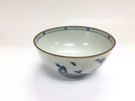 A blue and white Nanking cargo bowl with attached