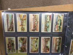 Eleven folders of players cigarette cards