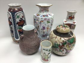 Four Oriental vases of various shapes and sizes, p
