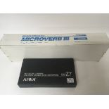 A boxed Microverb III and a boxed Aiwa zoom microp