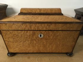 A Victorian burr maple tea caddy the hinged lid en