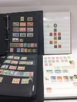Four stamp albums of GB and world stamps plus a sm