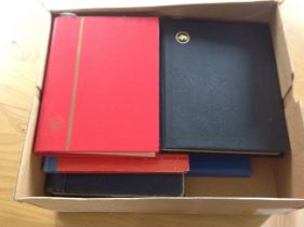 Box with 7 stock books and 3 "school-boy" albums -