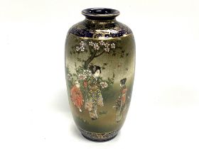 A small Japanese satsuma pottery vase with blue gr