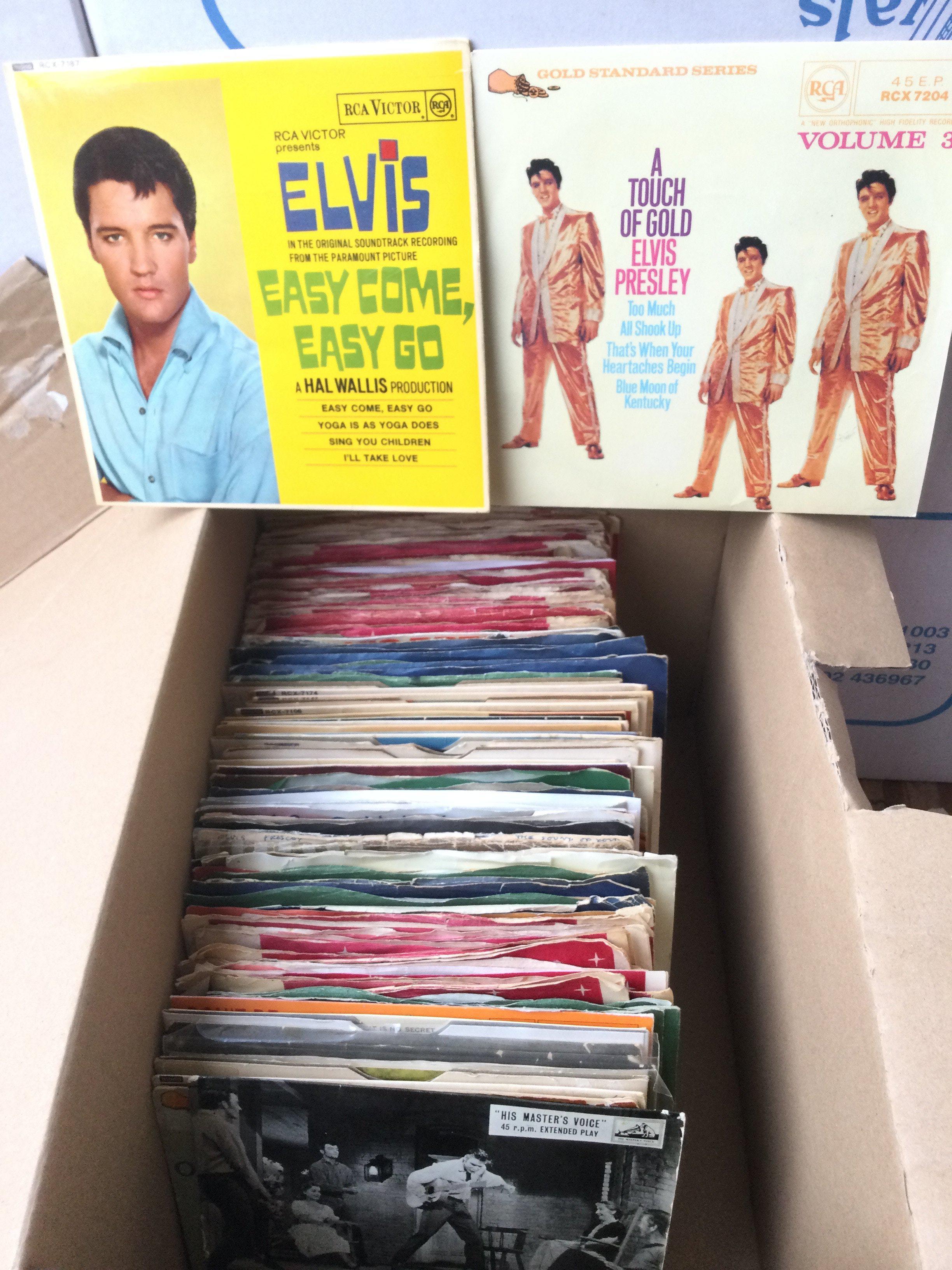 A collection of Elvis Presley 7inch singles and EP
