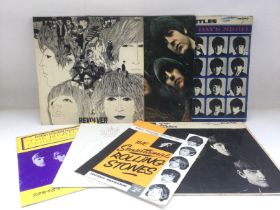 Four early UK pressings of Beatles LPs comprising