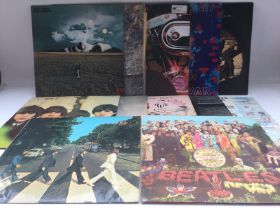 Twelve Beatles and solo released LPs comprising 'A