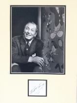 A mounted display of Walt Disney comprising signat