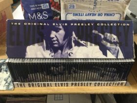 An Elvis Presley 1-50 CD collection box set. Some