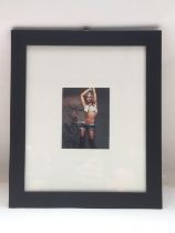 A framed and glazed signed photo of Britney Spears