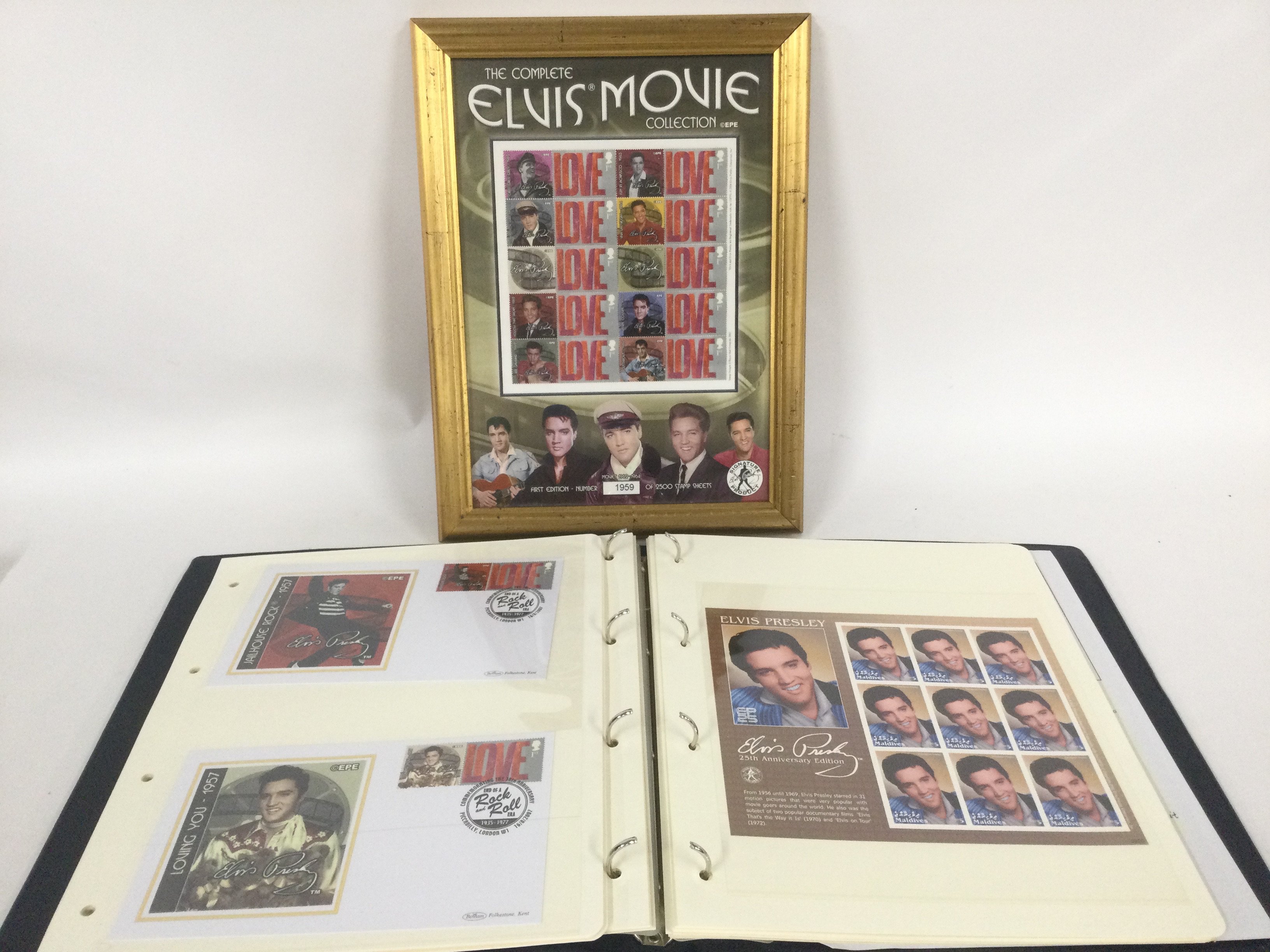 A collection of Elvis Presley stamps in two binder - Image 2 of 2