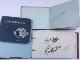 Three autograph booklets featuring Norman Wisdom,