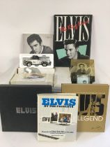 A collection of Elvis Presley memorabilia comprisi