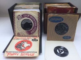 Two record cases of 7inch singles by various artis
