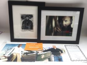 A collection of signed photos of actors and musici