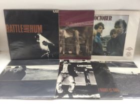 Four U2 LPs and three 12inch singles comprising 'O