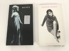 Two CD long box sets comprising Sandie Shaw 'Nothing Comes Easy' and 'Simply... Dusty'.