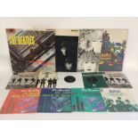 A collection of Beatles LPs, EPs and 7inch singles