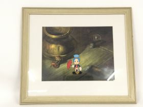 A framed and glazed Jiminy Cricket artwork animati